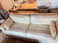 Full view of floral 3-seat sofa