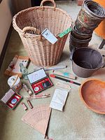 overview of lot showing basket, planters, bowl, bin, Asian decor items