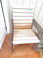 wood-slat patio armchair with metal frame