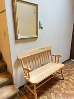 Front view of bench beneath matching wall mirror