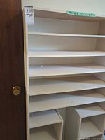 Front view showing shelves and cubbies