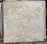 Front view of one tile showing beige/cream marbled surface