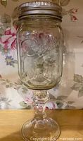 Full view of Ball mason jar wine glass with lid