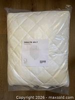 Front view of sealed IKEA PS 2017 quilted blanket package