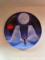 Front of plate showing polar bear Coke design