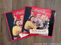 Front covers of both calendars