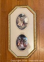 Full view of framed art showing gold octagon shape and both prints