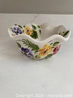 Side view of floral ceramic bowl