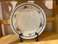 Front view of plate on stand showing full pattern