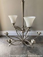 Closer view of upper section with two attached frosted glass shades