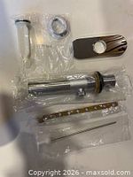 All parts in sealed bags: drain body, escutcheon plate, stopper, mounting ring, strap, lift rod