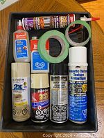 Overview of full lot inside black paint tray