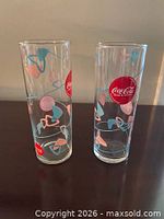 Pair of Libbey Coca-Cola atomic amoeba highball glasses front view