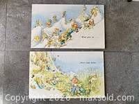 Both laminated prints side by side showing full illustrations and size comparison