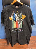 Front view of black Fruit of the Loom T-shirt showing Bourbon Street jazz band graphic