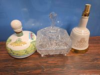 Overall view showing both ceramic liquor containers and cut glass covered candy dish