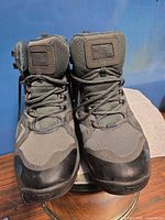 Front view pair grey/black The North Face hiking boots showing laces, uppers and Vibram toe branding