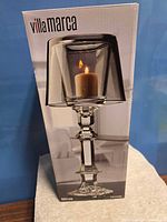 Front of boxed VillaMarca crystal votive lamp