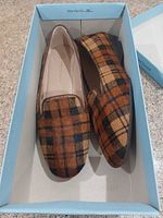 Pair of plaid calf-hair loafers in box