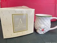 Mug beside original Avon Bunny Collection box