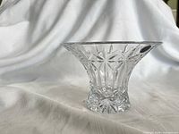 Full view of flared clear crystal bowl showing star cut pattern and overall shape