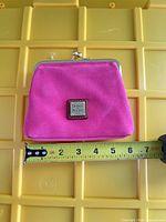 Front view showing logo plate and width measurement