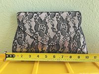 Front view showing lace overlay and width measurement