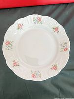 Front view of single Rose Garden plate showing design and condition