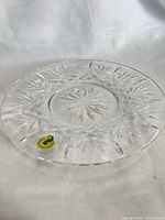 Single Waterford crystal salad plate front view with sticker visible