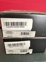 Manufacturer barcode labels on two Waterford boxes