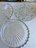 Group shot of all three clear glass pieces