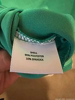 Material content tag showing 90% polyester 10% spandex