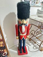 Front view of large wooden soldier nutcracker