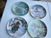 Group shot of all four decorative plates