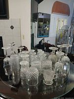 Group view showing variety of stemware, tumblers and creamer