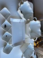 All five white porcelain pieces displayed: rectangular platter, two handled bowls, two double dip dishes