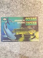 Front cover of album showing title, artwork, 25¢ price