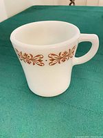 Side view showing Copper Filigree pattern and handle