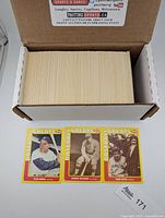 Large stack of approx 350 yellow-border 1991 Swell Baseball Greats cards with Yogi Berra, Honus Wagner and Babe Ruth shown