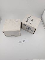 Two white card storage boxes labelled 93-94 Classic Hockey Full Set and 1993 Classic Draft Picks Set