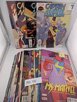 Stacked Captain Marvel & Ms. Marvel comics fronted by Captain Marvel & the Carol Corps #7 and Ms. Marvel #1