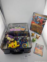 Overall lot with open tin, figures, jumbo card and standard card
