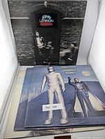 Front view of four album jackets including John Lennon Rock ’n’ Roll and two Ringo Starr Goodnight Vienna