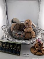 Overall lot showing pewter bowl, plush rabbits, miniature figurines and boxed items
