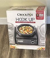 Front of sealed Crock-Pot Hook Up box showing product image and branding