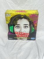 Front of boxed Hasbro Hearing Things game