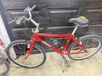 Full view of red Specialized Hard Rock mountain bike