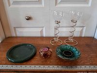 All five items arranged with ruler for scale