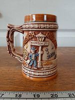 Front view showing relief design and text