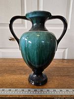 Full front view showing urn shape and drip glaze